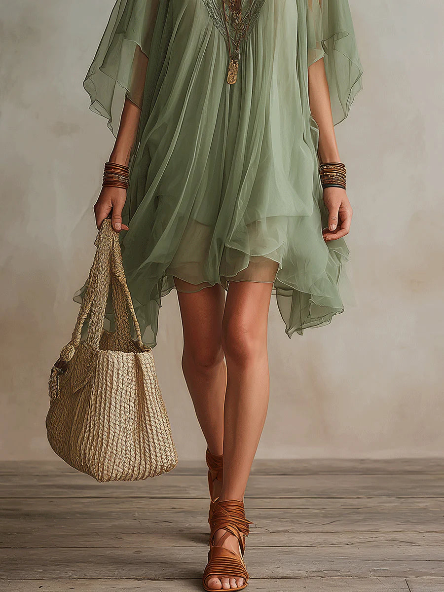 Layered fluid mini dress with V-neck in green