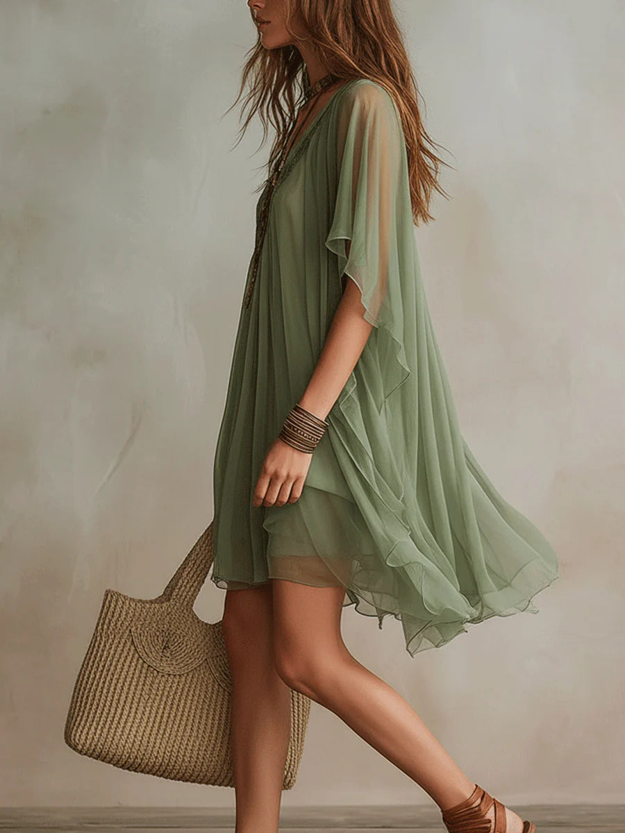 Layered fluid mini dress with V-neck in green